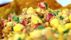 corn salad in a bowl with tortilla chips