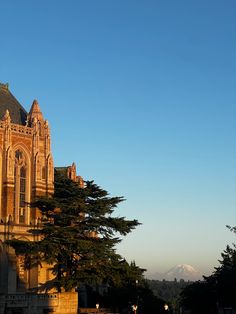 an old building with a clock tower on top