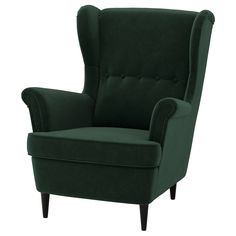 the green chair is upholstered and ready to be used as an accent piece