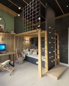 a room with a loft bed, desk and climbing wall in it's center