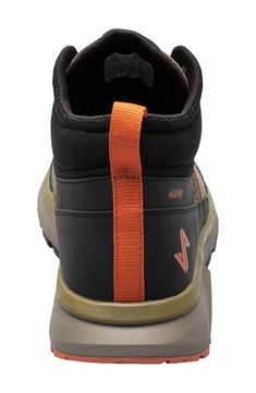 the shoe laces are attached to the side of a black and orange sneaker