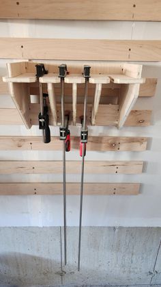 there are two ski poles in the middle of this room with some wood planks on the ceiling