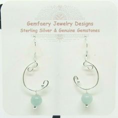 ***Handmade Sterling Silver Wire-Wrapped Natural AMAZONITE Gemstone Dangle Earrings...USA Made ***Genuine Amazonite Gemstone Beads.  Amazonite Gemstones measure approximately 6 mm diameter.   ***Sterling Silver Findings, Wires, Beads ***Earrings measure approximately 1.65 inch long, including wire.  ***These are natural, mined gemstones, not man-made. There are no anti-tarnish chemicals used on this jewelry. The Sterling Silver has no nickel. Retail value: $99.99. Handmade in USA in Kearney MO; Adjustable Dangle Wrap Earrings For Jewelry Making, Handmade Adjustable Dangle Wrap Earrings, Adjustable Hand Wrapped Dangle Earrings, Hand Wrapped Dangle Wrap Earrings As Gift, Wire Earrings Handmade, Earring Styles, Gemstone Drop Earrings, Sterling Silver Wire Wrap, Beads Earrings