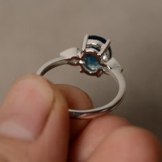 This is a gorgeous handmade creation. Its beauty is its simplicity & Elegance. The 7*9mm oval cut London blue topaz is crafted in solid sterling silver and with rhodium plated. All item is sent in a beautiful gift box You can realize more lovely stuff clicking the link https://www.etsy.com/shop/knightjewelry?refshopsection_shophome_leftnav Please leave the correct address and you phone number for delivering successfully. Blue Topaz Ring Sterling Silver, London Blue Topaz Ring, Pinky Ring, London Blue Topaz, Blue Topaz Ring, London Blue, Topaz Ring, Beautiful Gift Boxes, Ring Sterling Silver