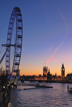 the london eye and big ben at sunset