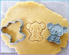 two cookie cutters shaped to look like koala bears and a bear with a cub