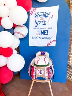 a baseball themed birthday party with balloons and cake