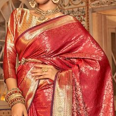 Red colored saree is made from kanjivaram silk fabric which is highlighted with beautiful weaving work as shown. Comes along with unstitched kanjivaram silk blouse piece which you can customise as per your design/style. Occasion - You can wear this saree for party, functions and special occasion, ideal for any fashionista. Note:- The actual product may differ slightly in color and design from the one illustrated in the images when compared with computer or mobile screen. Measurements: Saree : KanjiVaram : 5.5 Mtrs Blouse : KanjiVaram Silk : 0.8 Mtr Material: KanjiVaram Silk Stitch Type: Unstitched Country of Origin: India Care Guide: Dry Clean