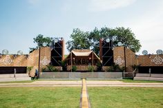 an outdoor concert venue set up in the middle of a park