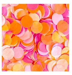 colorful confetti circles are scattered on top of each other in pink, orange and yellow