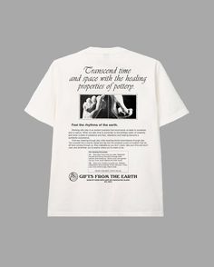 a white t - shirt with an image of two hands holding each other