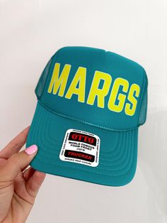 Margs Trucker Hat Made to Order | Summer Trucker Hat | Party Trucker Hat  Details -  - Foam & Polyester with mesh backing. - Braided top detail  - Adjustable back snaps. - One size fits most Note -  - Trucker Hats are shipped Monday - Friday excluding holidays.  - Each order is shipped to the address provided. If there is an issue with the customers provided address we are not responsible for lost or stolen packages.  - If interested in custom hats please send us a message. - No Returns on Hat P Cheap Green Trucker Hat For Outdoor Activities, Retro Adjustable Mesh Hat, Retro Mesh Cap, Green Visor Hat With Letter Print, Green Snapback Hat With Short Brim For Summer, Green Trucker Visor Hat, Green Trucker Hat With Visor, Curved Brim Mesh Hats With Letter Print, Green Mesh Summer Hat