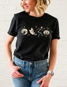 Our Sweet Memories Vintage Tees have a fun, vintage feel with a retro look that will make this shirt feel like it`s been in your closet for years. Perfect for everyday casual wear! Our Vintage Halloween Tee features Skeletons, Ghosts, Pumpkins & Witches! This unisex t-shirt is sure to be a hit this Halloween season. This classic t-shirt is made from 100% cotton and is pre-shrunk for a comfortable fit. It's available in a variety of sizes so you can find the perfect one for you. Get your Vintage Trick Or Treat Yourself, Spooky Style, Hoodies Art, Pumpkin Witch, Street Sign, Halloween Tees, Sweet Memories, Halloween Season, Retro Look