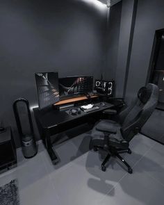 a computer desk and chair in a room