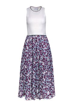 When a ribbed knit is attached to a silk blend skirt, you get this beautiful floral print dress by Tanya Taylor. We love how comfortable yet polished this style is! It can be worn on special weekends or dressed up for cocktails, dinner, drinks, you name it. It can even work in all seasons with a light jacket for cooler months. Size M Bodice 43% Cotton, 40% Polyester, 15% Nylon, 2% Spandex Skirt 55% Silk, 40% Cotton, 5% Spandex Lining 100% Cotton Pull over Knit bodice Sleeveless Maxi length Black White Floral Print Stretch Midi Dress, Spring Fitted Sleeveless Viscose Dress, Fitted Viscose Sleeveless Dress For Spring, Spring Viscose Fitted Sleeveless Dress, Flowy Viscose Sleeveless Dress, Sleeveless Viscose Dress With Flowy Skirt, Spring Viscose Stretch Midi Dress, Spring Stretchy Viscose Midi Dress, White Sleeveless Viscose Dress