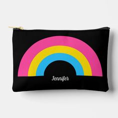 a black zipper bag with a rainbow design on the front and name written in white