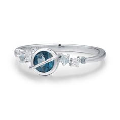 A celestial masterpiece that will leave you spellbound. Our Planet Ring features a london blue topaz center stone that captures the enchanting allure of Saturn, crafted with meticulous detail. Adding to the celestial allure, delicate accents of aquamarine and white topaz gracefully orbit around the center stone, reminiscent of twinkling stars in the night sky. Embrace the magic of the universe and let your style soar to new heights. Let your own unique light shine brightly. ✦ Available in both 1 Bff Rings, Planet Ring, Twinkling Stars, Gold Vermeil Jewelry, London Blue Topaz Ring, Ring White Gold, Shop Engagement Rings, Green Onyx, Mens Jewelry Bracelet