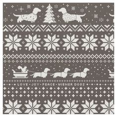 a knitted christmas sweater with dogs and snowflakes on the bottom, in grey