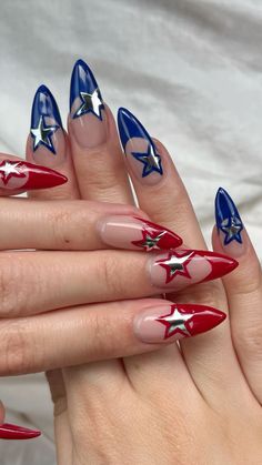 Gelx nails stiletto almond star nails silver metallic america americana design 4th of july red blue French tips Summer Nails 2024 4th Of July, Blue French Tips Design, Fourth Of July Nails Stiletto, Red White And Blue Star Nails, Fourth Of July Chrome Nails, Red And Blue Star Nails, Stiletto Nail Inspo Summer, Blue Red And White Nails, Red And Blue Nail Ideas