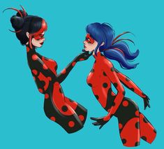 two women dressed in red and black polka dot outfits, one holding the other's hand