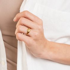 Gold sunburst signet ring. Beautiful statement piece. Easy to wear it alone or stack it with other rings. A perfect addition to your jewelry collection! ………………………………….D E T A I L S• Materials: Stainless steel, 18k gold plating.• Size: US 6 (Diameter: 16.5mm), US 7 (Diameter: 17.3mm), US8 (Diameter: 18.2mm))• This product is hypoallergenic, water and tarnish resistant Gold Finger Rings, Gold Sunburst, Ring Settings Types, Stamped Rings, Friendship Rings, Light Ring, Linking Rings, Love Light, 18k Gold Ring