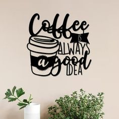 coffee is always a good idea wall art sticker on the wall next to a potted plant