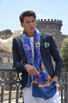 Indulge in opulent sophistication with our exquisite Italian-made silk scarf in regal purple, adorned with meticulously hand-embellished paisley patterns. This luxurious accessory is a testament to Italian craftsmanship, with every detail meticulously crafted by skilled artisans. Wrap yourself in the sumptuous softness of high-quality silk, as the intricate paisley motifs add a touch of timeless charm. The entire scarf is meticulously hand-edged, showing the dedication to artisanal excellence th Scarf Outfit Men, Purple Silk Scarf, Italian Silk Scarf, Scarf Outfit, Purple Silk, Paisley Design, Italian Luxury, Paisley Pattern, Pure Silk