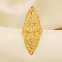 This handcrafted gold ring is designed to be both timeless and versatile. With its sleek lines and polished finish, it adds a touch of sophistication to any outfit. Perfect for daily wear or special occasions, it's a true staple for any jewelry collection. 22k Gold  Ring Metal is Real Gold Purity is 22kt  Weight is 8.12 grams approx Ring Size is 10 US Max width is 4.9 cm approx ,  Please feel free to ask if you have any query. Return and cancelltion-  a 20% restocking fees will be deducted for c Lehenga Designs Latest, 22k Gold Ring, Long Ring, Big Ring, Gold Ring Designs, Gold Designs, Gold Jewelry Simple, Jewelry Simple, Big Rings