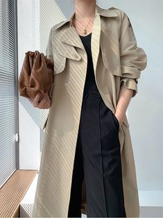 This belted midi-length trench coat is an elegant and sophisticated wardrobe staple for the modern woman. With a stylish gun flap, flap pockets, and true-to-size fit, it's a timeless classic that can be dressed up or down for a variety of occasions. Long sleeves with belted cuffs Notched lapels Flap pockets Lined Cotton, polyester Machine wash, tumble dry Women's trench coat Item #310312 Size info XS=US2=UK6=EU32 S=US4-6=UK8-10=EU34-36 M=US8-10=UK12-14=EU38-40 ★★ It would be helpful if you provi Beige Outerwear With Belted Cuffs For Office, Office Outerwear With Belted Cuffs, Modern Belted Spring Outerwear, Elegant Khaki Business Casual Outerwear, Elegant Khaki Outerwear For Business Casual, Beige Belted Outerwear For Business Casual, Belted Solid Outerwear For Work, Belted Solid Workwear Outerwear, Office Long Coat With Belted Cuffs