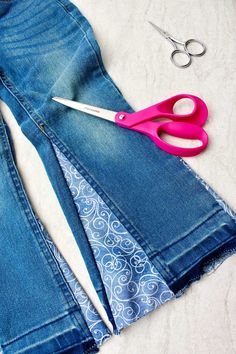 This 70’s girl shows you how to make jeans into bell bottoms. This is a groovy upcycle project that you'll love and use to make pants fun!!! #WelcometoNanas #DIYBellBottoms #UpcycleProject #BellBottomJeans How To Turn Pants Into Bell Bottoms, Jeans With Seam In Middle, Lengthen Pants Diy, How To Style Bell Bottoms Jeans Winter, Upcycle Bell Bottom Jeans, Diy Bell Bottom Pants, Making Bell Bottoms Out Of Jeans, Turn Jeans Into Bell Bottoms, Flared Jeans Pattern