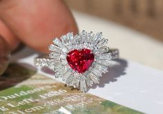 * Condition: Brand new * Center Stone: Natural Ruby from Myanmar, Heart Cut, approx 1.09ct or Natural Emerald from Colombia, Heart Cut, approx 0.68ct * Side Stone: Natural White Diamond, Round Cut & Baguette Cut (VS1 clarity with F color) * Metal Purity: 18k Solid White Gold * Free DHL Express Shipping. * Attached with Certificate. * Each piece is made-to-order with care and special attention to detail. all items are made with conflict-free diamonds and gems. * The item will be gift wrapped and Heart Cut Ruby Ring With Diamond For Wedding, Gia Certified Fine Jewelry Rings For Valentine's Day, Platinum Heart Ring As A Gift, White Gold Ruby Ring With Heart Cut Diamond, Brilliant Heart Cut Ruby Ring In Fine Jewelry Style, White Gold Ruby Ring With Diamond Heart Cut, Heart Cut Ruby Ring In White Gold, Gia Certified Heart Shaped Anniversary Ring, Fine Jewelry Ruby Ring With Heart Cut Brilliant Stone