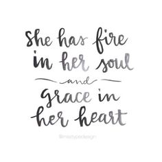 the words she has fire in her soul and grace in her heart on white paper