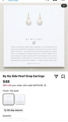 a pair of pearl drop earrings on sale