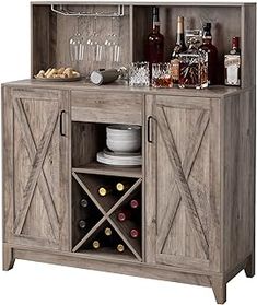 a wooden cabinet with wine glasses and bottles