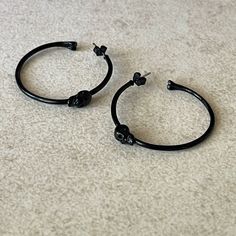 Brand: Wildfox Condition: New Without Tags Size: About 2" As Shown Description: Black Skull Hoop Earrings - Bundle To Save On Shipping! Offers Accepted Adjustable Black Skull-shaped Earrings, Adjustable Black Skull Earrings, Black Hoop Earrings For Streetwear, Black Hoop Jewelry For Streetwear, Black Punk Hoop Earrings, Punk Style Black Hoop Earrings, Black Skull, Earring Bundle, Jewelry Black