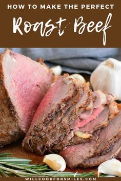 sliced roast beef on a cutting board with rosemary sprigs and garlic in the background