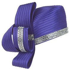 The Giovanna HR22123-PUR Church Hat is a testament to timeless fashion fused with modern flair. This intricately designed accessory is not just a hat, but a piece of artistry, crafted to elevate your attire to new heights of elegance. Its stunning purple hue is versatile enough to complement a wide range of outfits, ensuring you'll catch the eye of admirers at any upscale gathering. The hat boasts a unique layered wrap style that creates a dynamic and voluminous silhouette. This distinctive desi Church Hat, Church Suits, Church Hats, Of Outfits, Purple Hues, The Eye, Wrap Style, One Size Fits All, Elegant Design