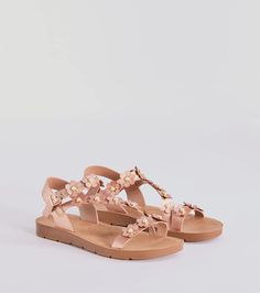 Give off cutie vibes in these floral strappy faux leather sandals! They feature a round toe, an asymmetric strappy design with adorable flower accents with faux pearl center detailing, an adjustable ankle strap and heel strap, and a flat sole for comfortable wear. Style with a flowy summer dress for a perf summer look.Fit & FeaturesFaux leather upperRound toeAsymmetric strappy designFlower design with faux pearl center detailsAdjustable ankle strap, heel strapFlat soleRuns true to size Flowy Summer Dress, Homecoming Shoes, Beach Wedding Guest Dress, Flowy Summer Dresses, Black Tie Wedding Guests, Black Bridesmaids, Bachelorette Outfits, Design Flower, Rhinestone Dress