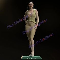 a female mannequin is standing on top of a green base and wearing a tan dress