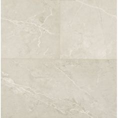 a white marble tile wall and floor