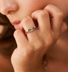 Meet our Mini Rainbow Band Ring- this whimsical piece is adorned with an arc of meticulously selected CZ stones, each shimmering with the joyous hues of the rainbow. Perfect for the color-loving daydreamer, this ring is more than an accessory—it's your very own piece of wearable joy. Rainbow Band, Zodiac Necklaces, Gold Piece, Flower Bracelet, Everyday Jewelry, Cz Stone, Huggies Earrings, The Rainbow, Pure Silver