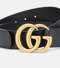 Finish your outfits on a sophisticated note with this black belt from Gucci. This calf leather piece cements its luxury status with the brand's iconic GG hardware front and center, shining bright in gold-toned metal. Style it with anything from denim to a luxe, languid silk skirt..Color of fastening: antique gold.Comes with dust bag.Made in Italy.Material: calf leather.Width 4cm-1.5'.Buckle width 5,5cm-2' Designer Black Belt With Metal Logo, Elegant Black Belt Buckles With Metal Logo, Designer Black Belts With Metal Logo, Luxury Black Belt Buckle With Gold-tone Logo Plaque, Designer Black Belt With Gold-tone Logo Plaque, Modern Black Belt With Gold-tone Logo Plaque, Modern Black Belt Buckle With Gold-tone Logo, Formal Black Belt Buckles With Gold-tone Logo, Designer Belts With Metal Logo For Business