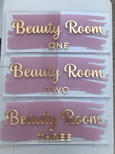 there are three signs that say beauty room, one beauty room and two beauty room