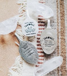 three spoons sitting on top of a towel