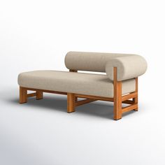 a wooden bench sitting on top of a white floor