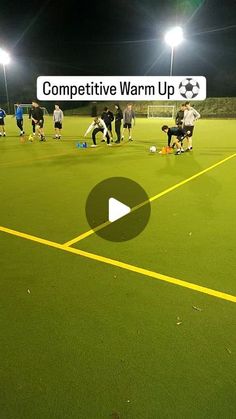 a group of people on a field playing soccer at night with the caption competitive warm up