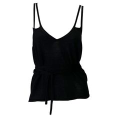 TheRealList presents: a black cashmere Gucci wrap-around tank top, designed by Tom Ford. From the late 1990s, this oh-so-soft tank top wraps around the body and features a v-shaped cut at the back, multiple straps, and a v-neckline. This never worn top is made complete with the original tags! This must-have top is the perfect piece to add to any Gucci by Tom Ford lover's collection! Follow us on Instagram! @_the_reallist_ Approximate measurements: Small 21.5" shoulder to hem Tom Ford Top, Gucci By Tom Ford, V Shape Cut, Knit Wrap, Wrap Around, V Shape, Tom Ford, Tank Top Shirt, Cashmere