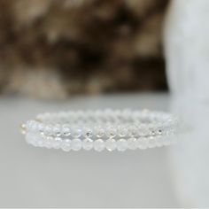 Brand New, Unused Gorgeous Dainty Genuine White (Clear) Topaz Beaded Gemstone Bracelet. Beads Are 1/8” In Diameter And Strung On Strong 6.75” Clear Cord, And Finished With Solid Sterling Silver .925 Clasp. This Bracelet Is Brand New And Has Never Been Worn! So Pretty Worn Alone, Sparkly And Delicate, Or Stacked With Other Bracelets. Each Bead Is Covered In Tiny Facets And Catches Light Beautifully. Bead Height 1/8” Total Bracelet Length 6.75” Weight 2g White Topaz Symbolizes Hope, Love, And Happ Minimalist White Crystal Jewelry, Elegant White Beaded Bracelets With Gemstones, Elegant White Gemstone Beaded Bracelets, Elegant White Beaded Gemstone Bracelets, Everyday White Crystal Bracelet With Faceted Beads, Delicate White Bracelets With Natural Stones, Delicate White Bracelet With Natural Stones, Dainty White Gemstone Beads Bracelet, Elegant Adjustable Gemstone Beads Crystals