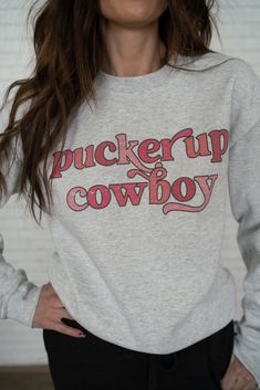 Pucker up cowboy! Designed for comfort and style Premium cotton Unisex sizing Classic fit 50% cotton 50% polyester Model is 5'1" and wearing a size small. The length of the size small measures 25.5". Small: 2-4 Medium: 6-8 Large: 10-12 Shirts Tops, Cowboy, That Look, Sweatshirts, How To Wear