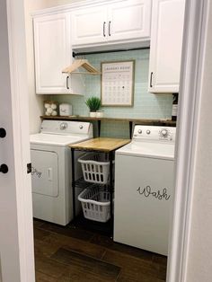 a washer and dryer sitting inside of a kitchen